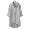 White women's relaxed-fit long-sleeve button-front blouse with patch chest pockets