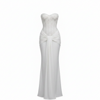 White strapless sequin evening gown with corset bodice and draped waist bow, slim maxi