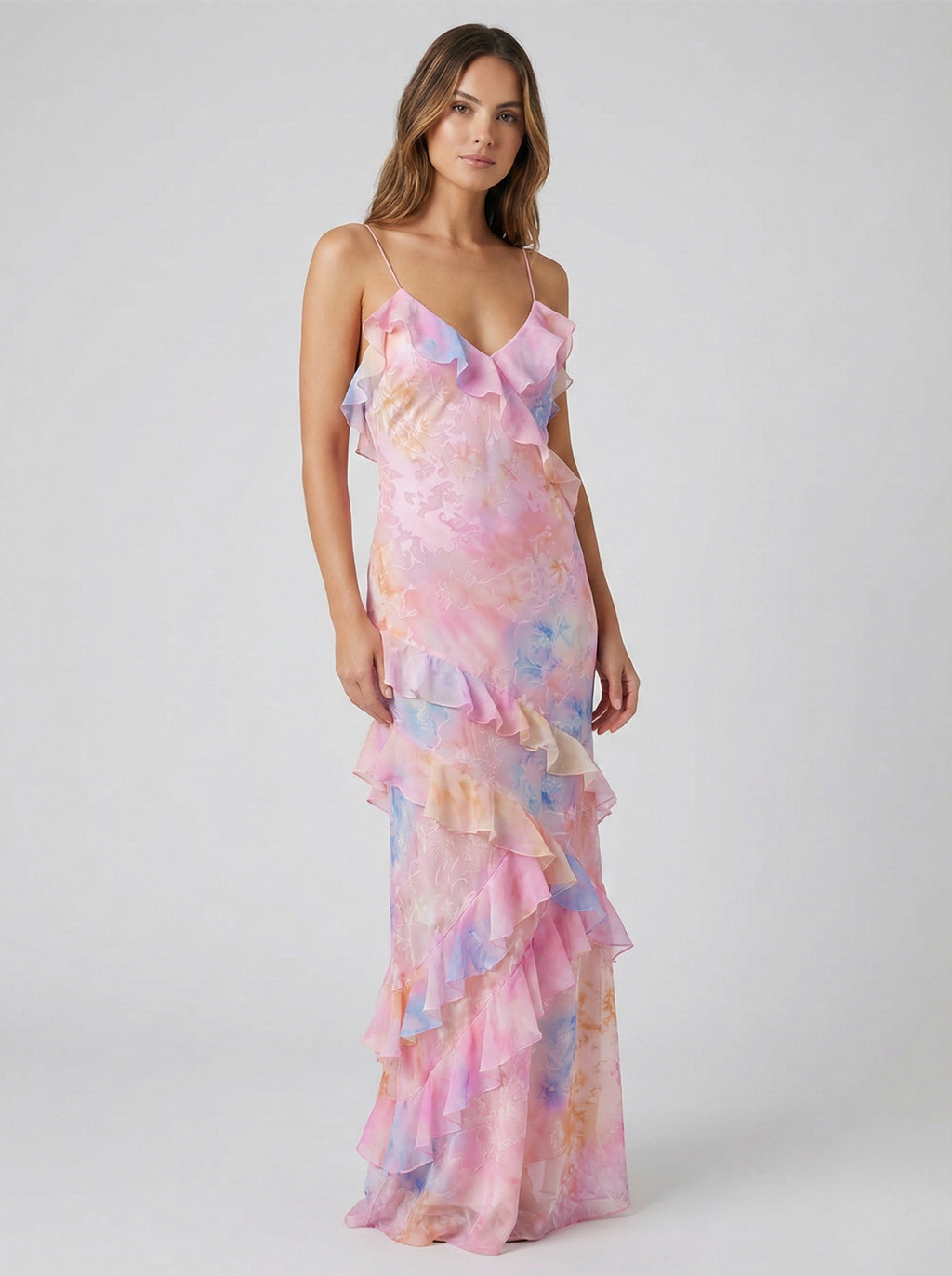 Pink pastel chiffon maxi dress with tiered ruffle layers and spaghetti straps