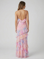 Pink pastel chiffon maxi dress with open-back V straps and tiered ruffle skirt