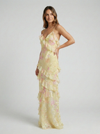 Yellow chiffon maxi dress with tiered ruffle skirt and thin spaghetti straps