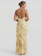 Yellow chiffon maxi dress with open-back V straps and tiered ruffle layers