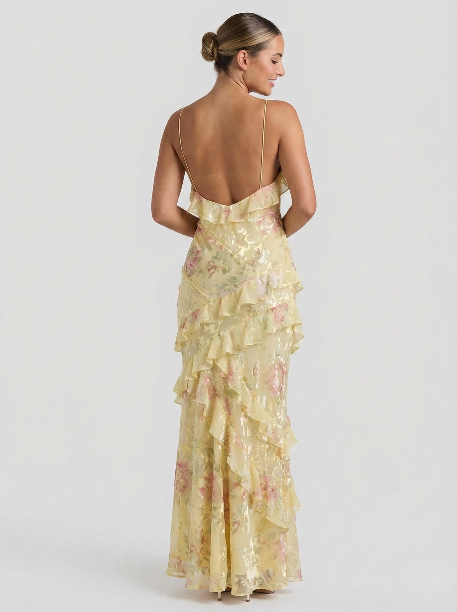 Yellow chiffon maxi dress with open-back V straps and tiered ruffle layers
