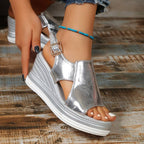 Silver metallic peep-toe wedge platform sandals with cutout upper and ankle strap