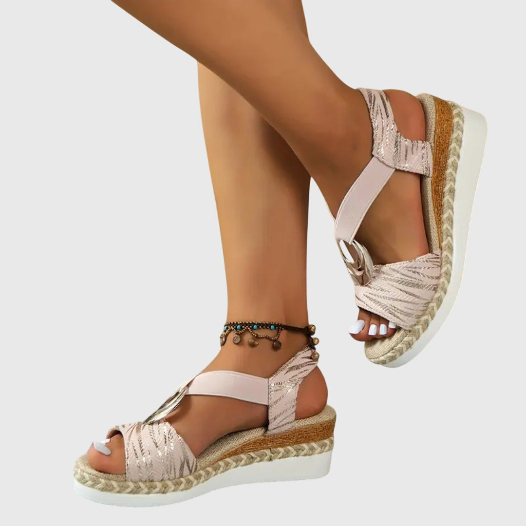 White espadrille platform sandals with open toe, tan wedge sole and silver ring detail