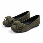 Wide-fit cushioned ballet flats, dark green faux suede, pair view with bow