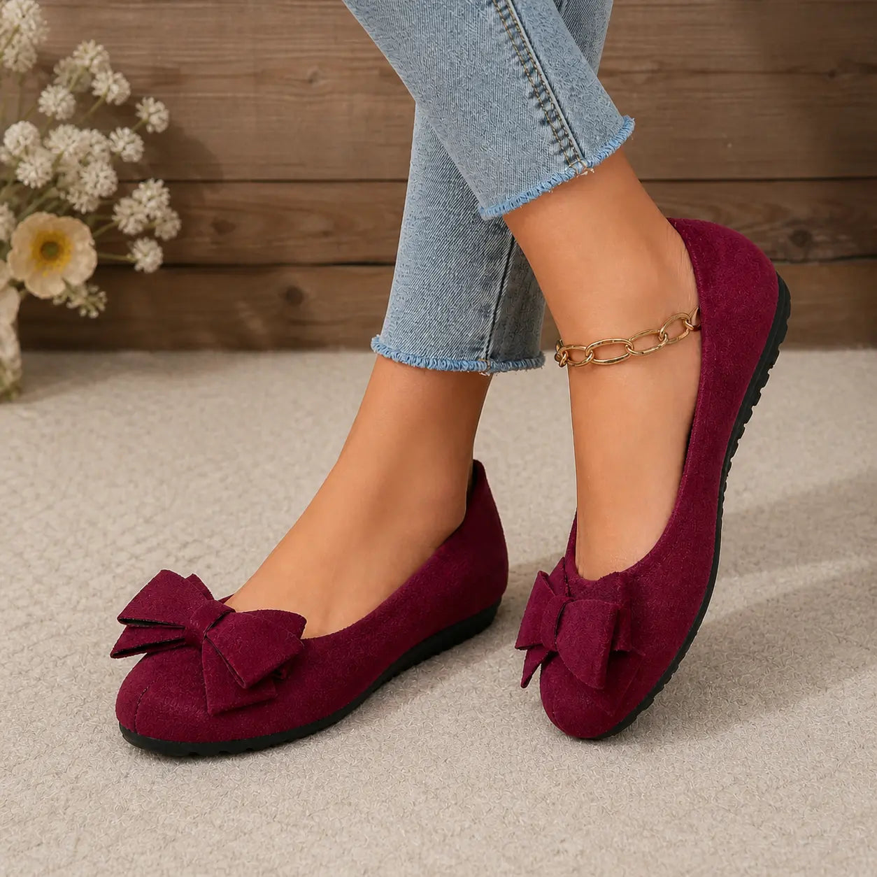 Burgundy faux suede ballet flats with bow and gold ankle chain, cushioned flat