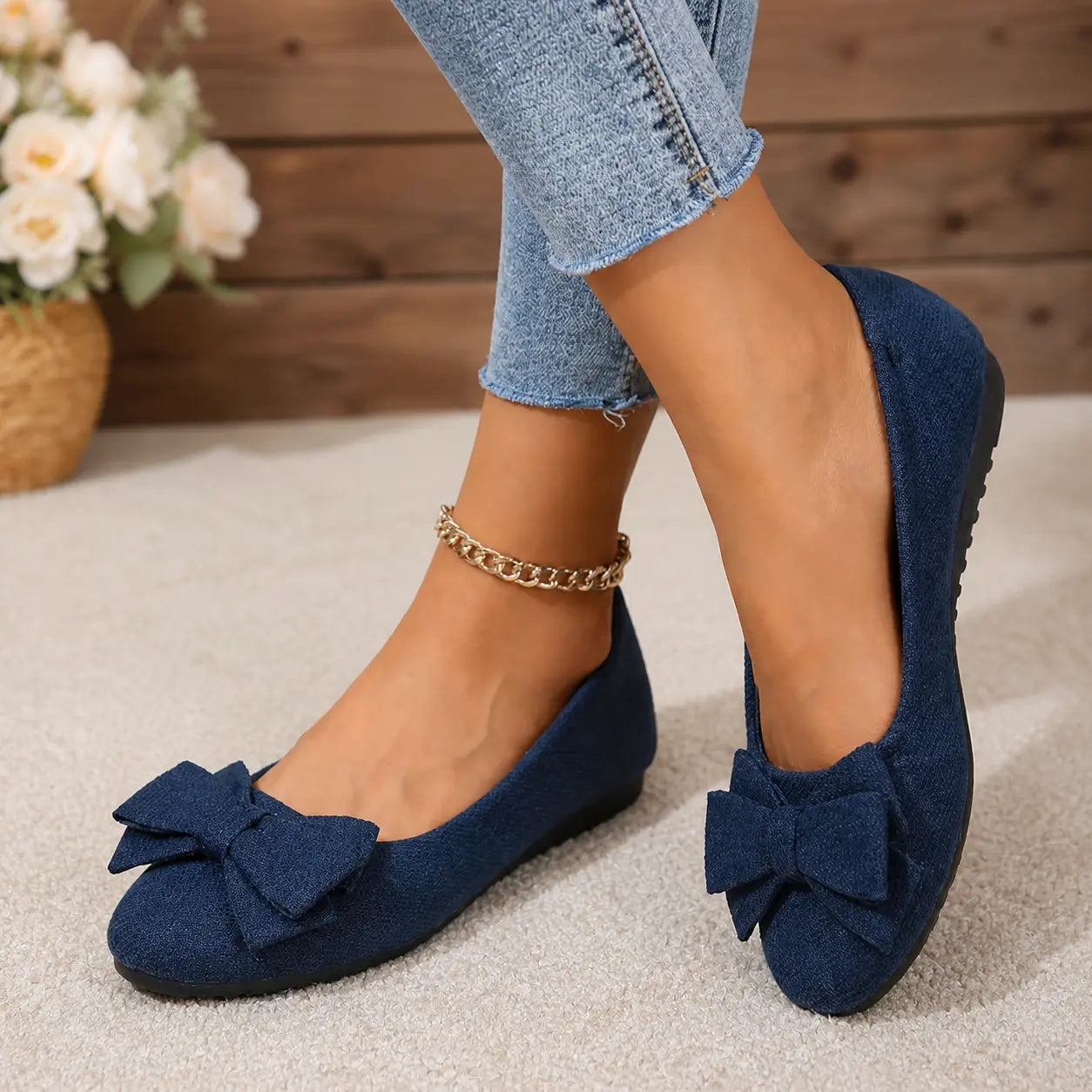 Navy faux suede ballet flats with bow and gold ankle chain, cushioned flat