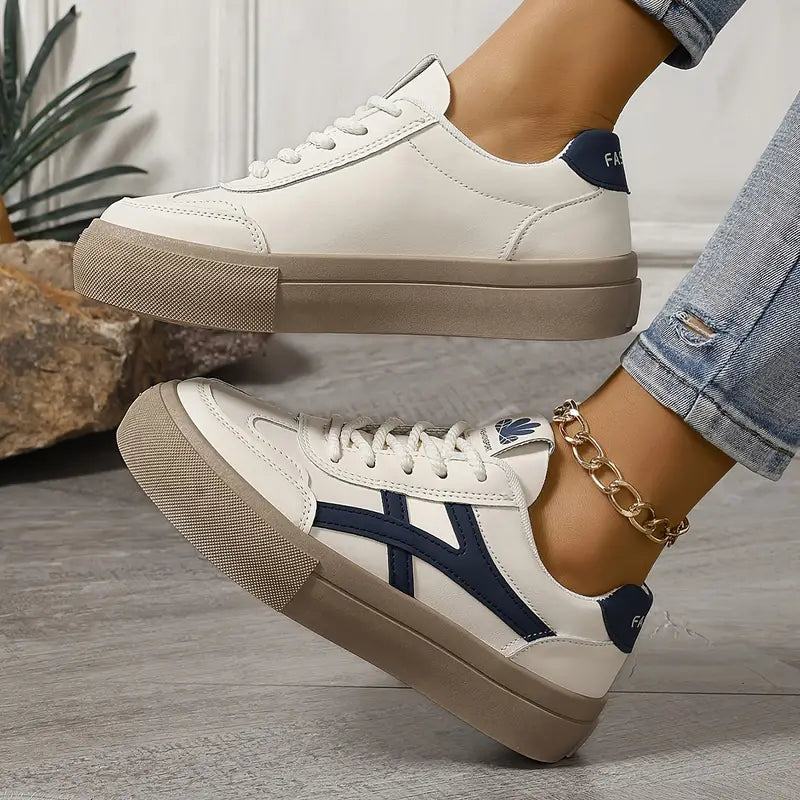 Women’s platform sneakers, white upper with navy stripes and textured tan platform sole