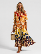 Multicolor printed shirt dress with button front, V-neck, and tiered relaxed skirt