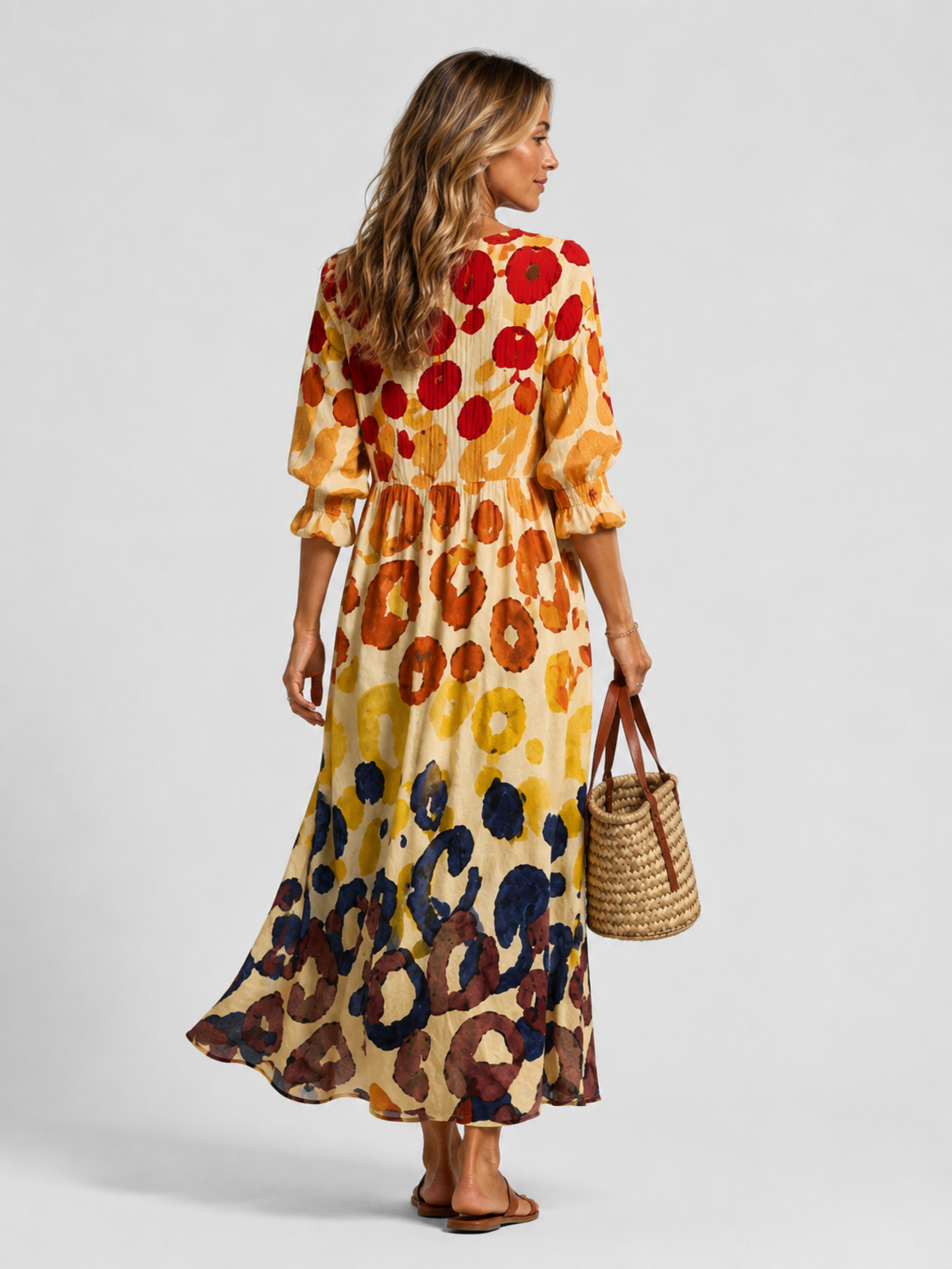 Printed shirt dress with V-neck button front, long skirt, and rolled short sleeves
