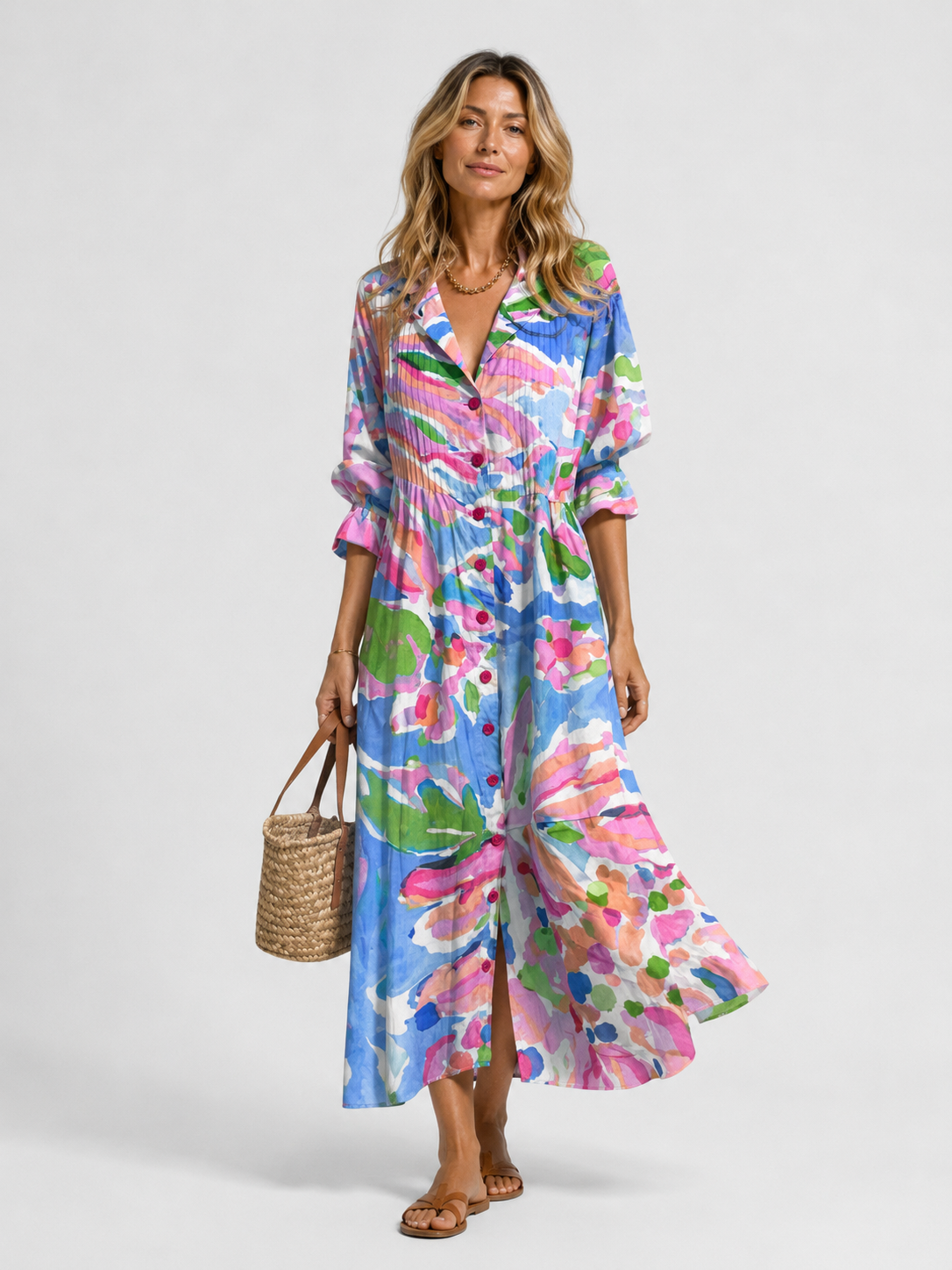 Blue and pink abstract printed shirt dress with V-neck buttons and three-quarter sleeves