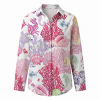 Printed split-neck blouse with button front, coral and sea-creature print, long sleeves