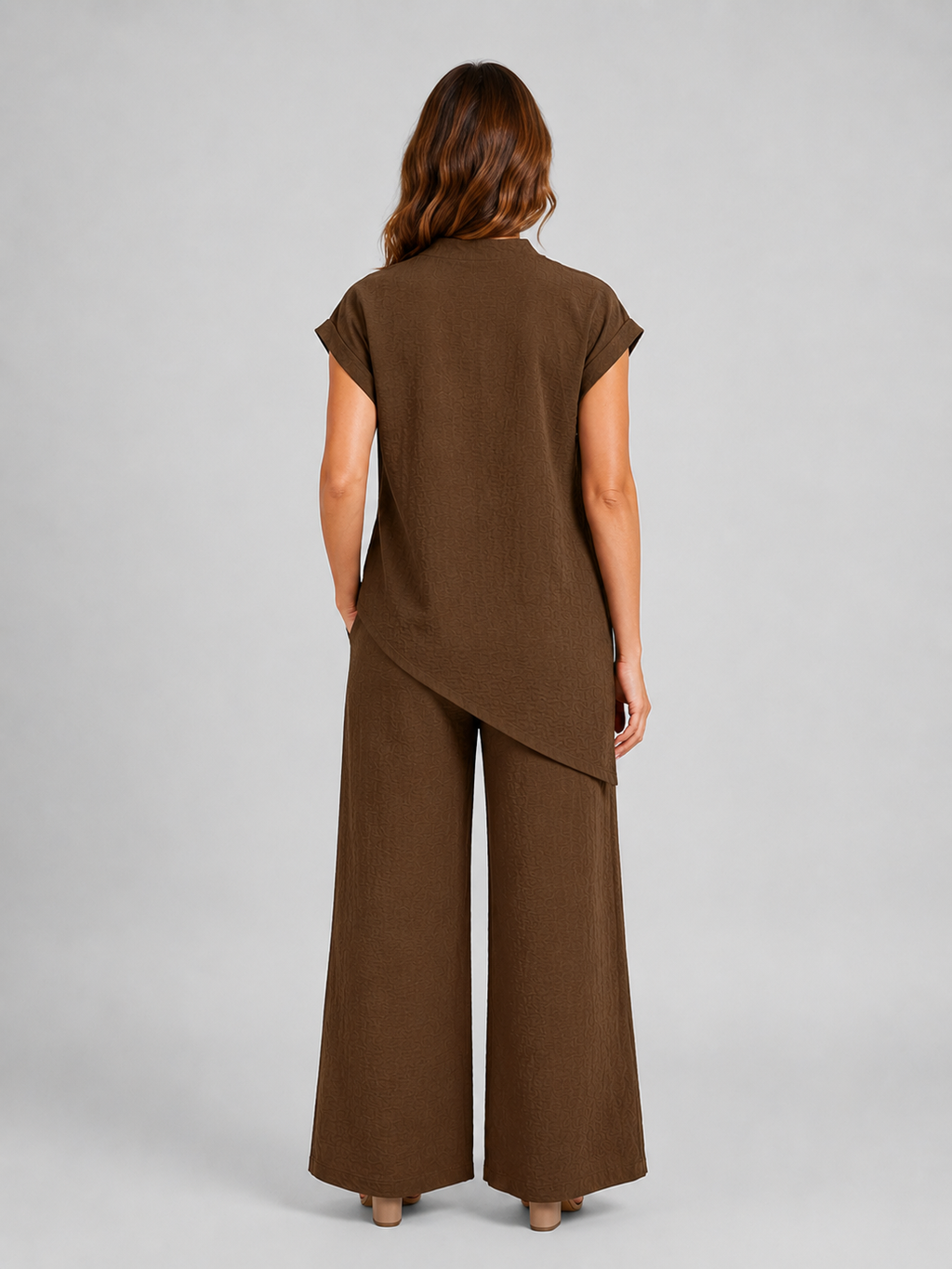 Women's relaxed co-ord set in coffee brown, back view: asymmetric top with wide-leg pants
