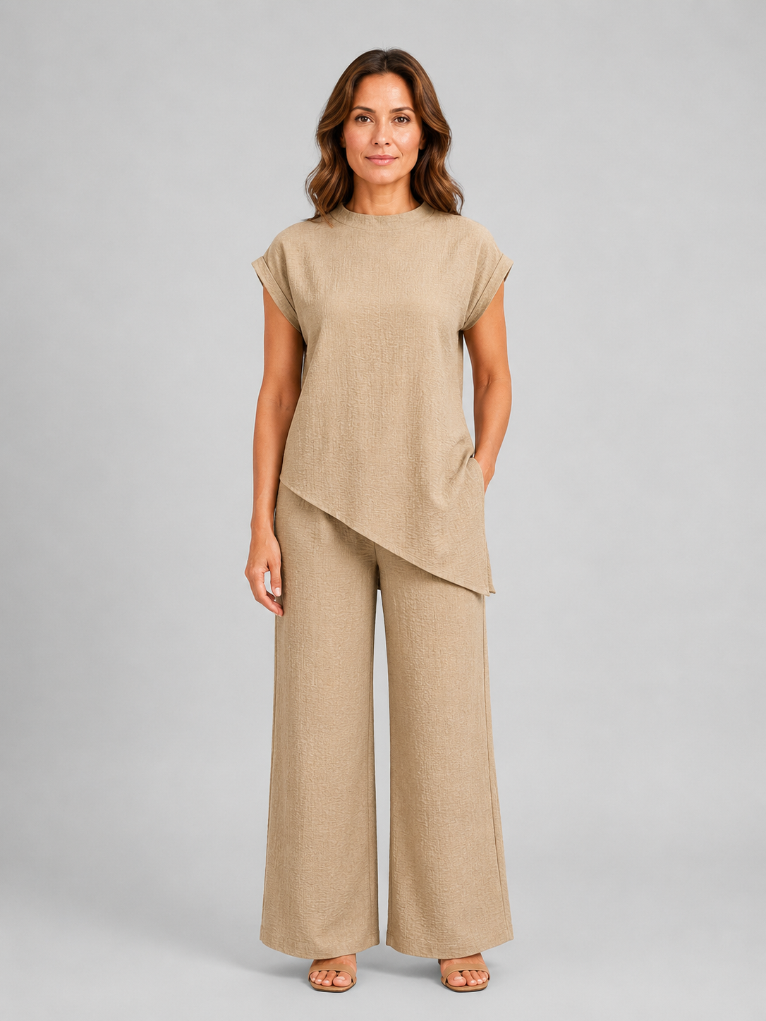 Women's relaxed co-ord set in beige: asymmetric sleeveless top and wide-leg trousers