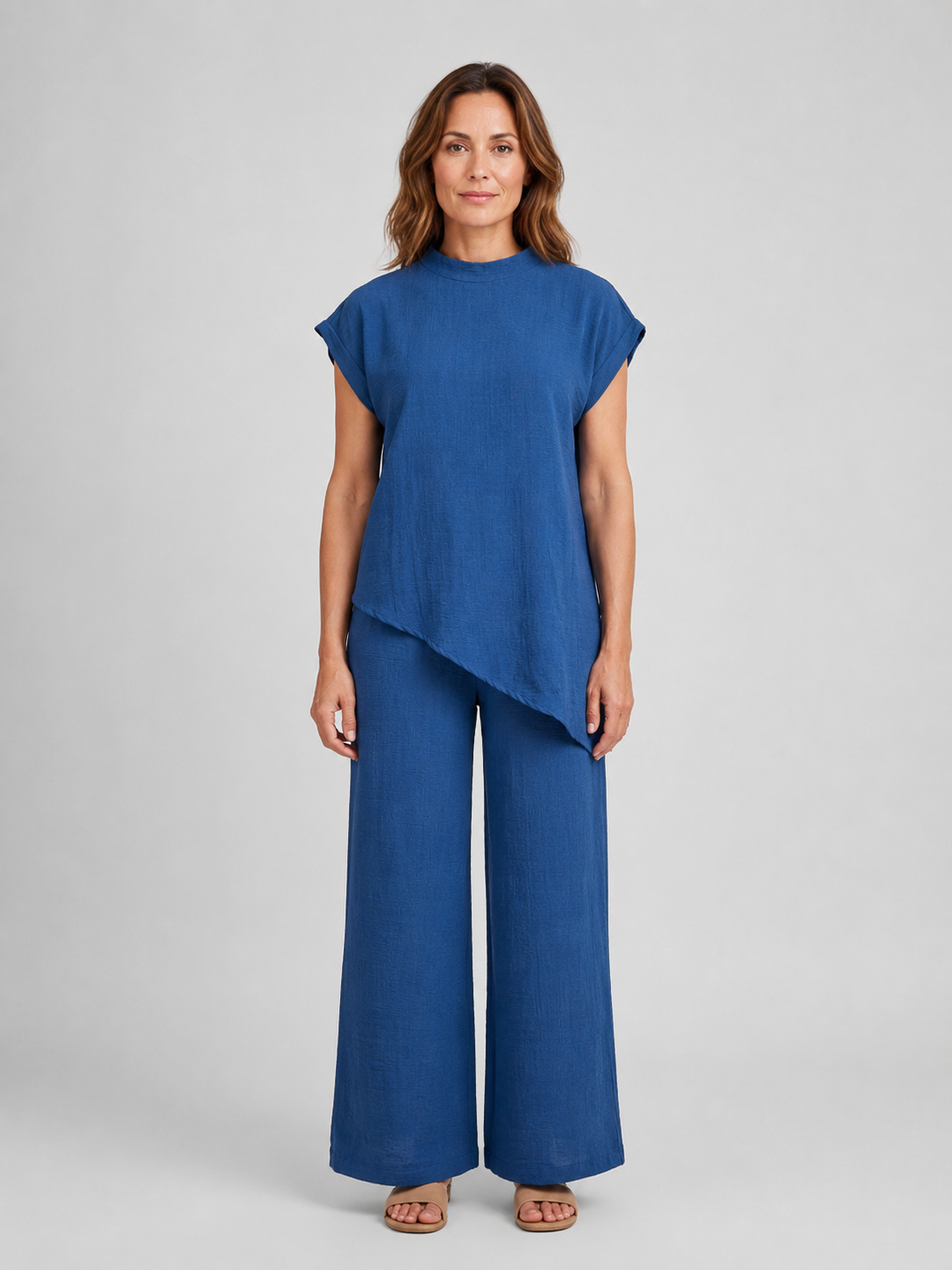 Women's relaxed co-ord set in blue: asymmetrical sleeveless top and wide-leg trousers