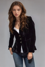 Black notch lapel blazer with flap pockets and three-button front, flared hem