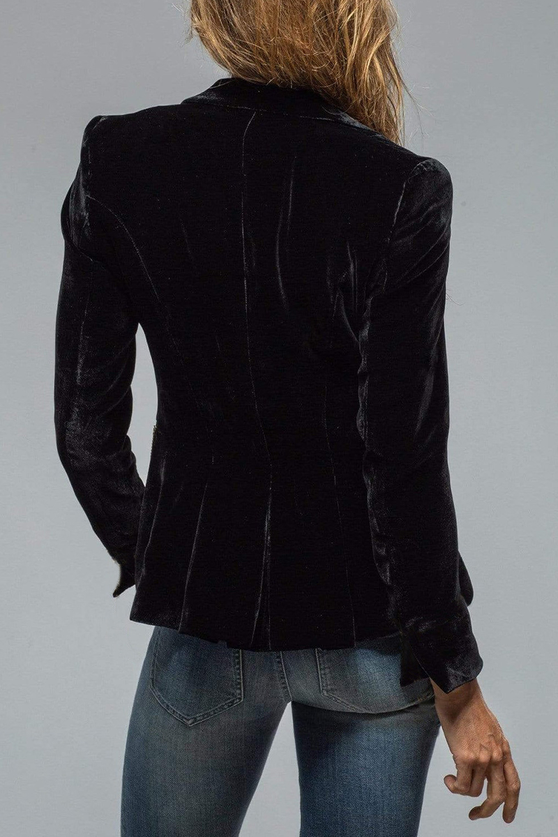 Black back view notch lapel blazer with tailored seams and flared hem