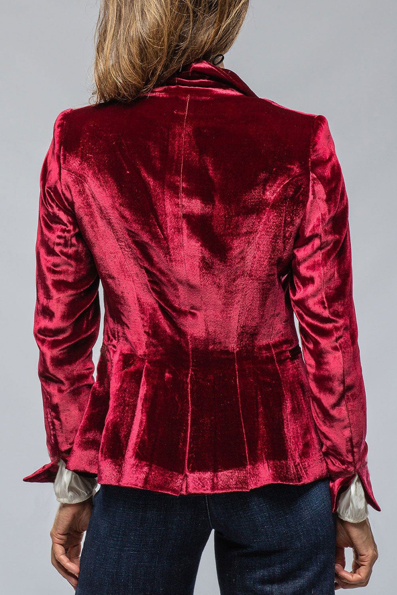 Dark red back view notch lapel blazer with flared hem and tailored seams