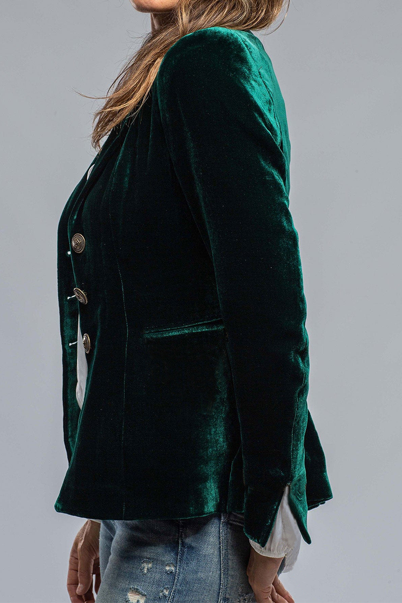 Green side view notch lapel blazer with three-button front and flared hem