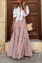 Women's high-waist maxi skirt with small floral print, gathered tiered skirt