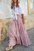 Women's high-waist maxi skirt with pink and green floral print, gathered tiered fabric