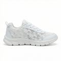 Single women’s white lace-up sneaker with patterned upper and thick cushioned tread sole
