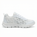 Single women’s white lace-up sneaker with patterned upper and thick cushioned tread sole