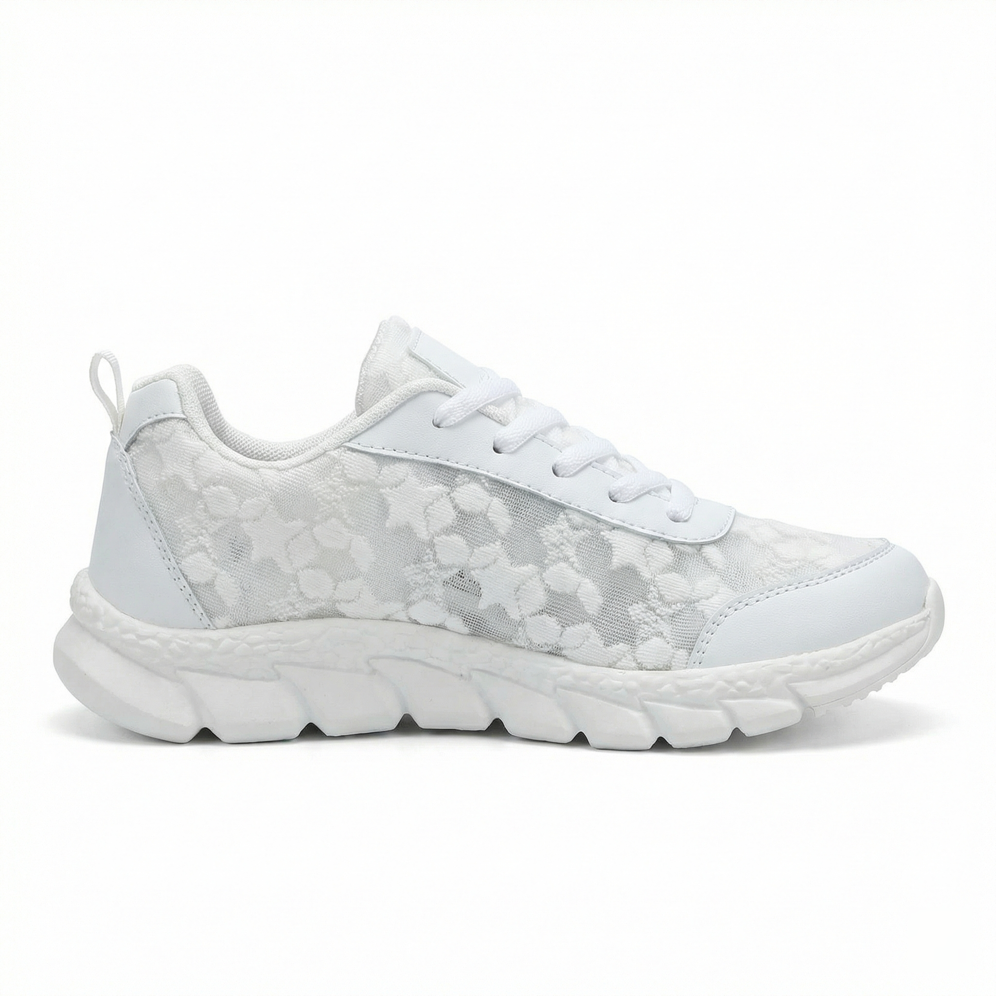 Single women’s white lace-up sneaker with patterned upper and thick cushioned tread sole