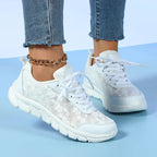 Women’s lace-up sneakers with white breathable upper and thick cushioned sole
