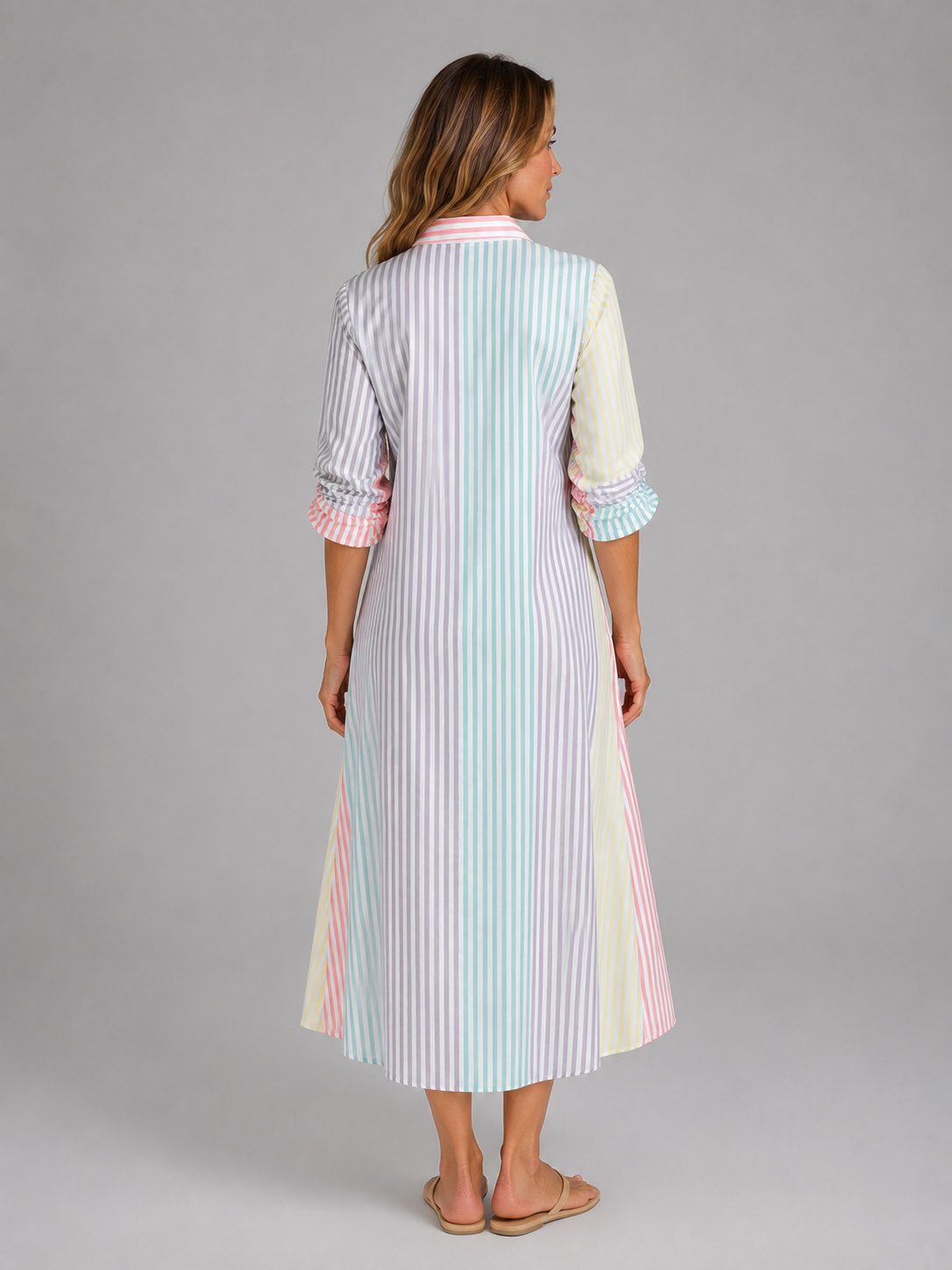 Pastel striped shirt maxi dress back view with button placket and long sleeves