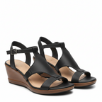 Black T-strap open-toe wedge sandals with ankle buckle strap and cushioned footbed