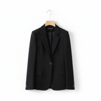 Black single-breasted blazer with notch lapels, flap pockets, and button front