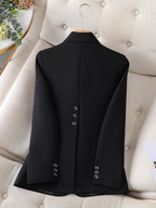 Black blazer back view with center seam and structured shoulders