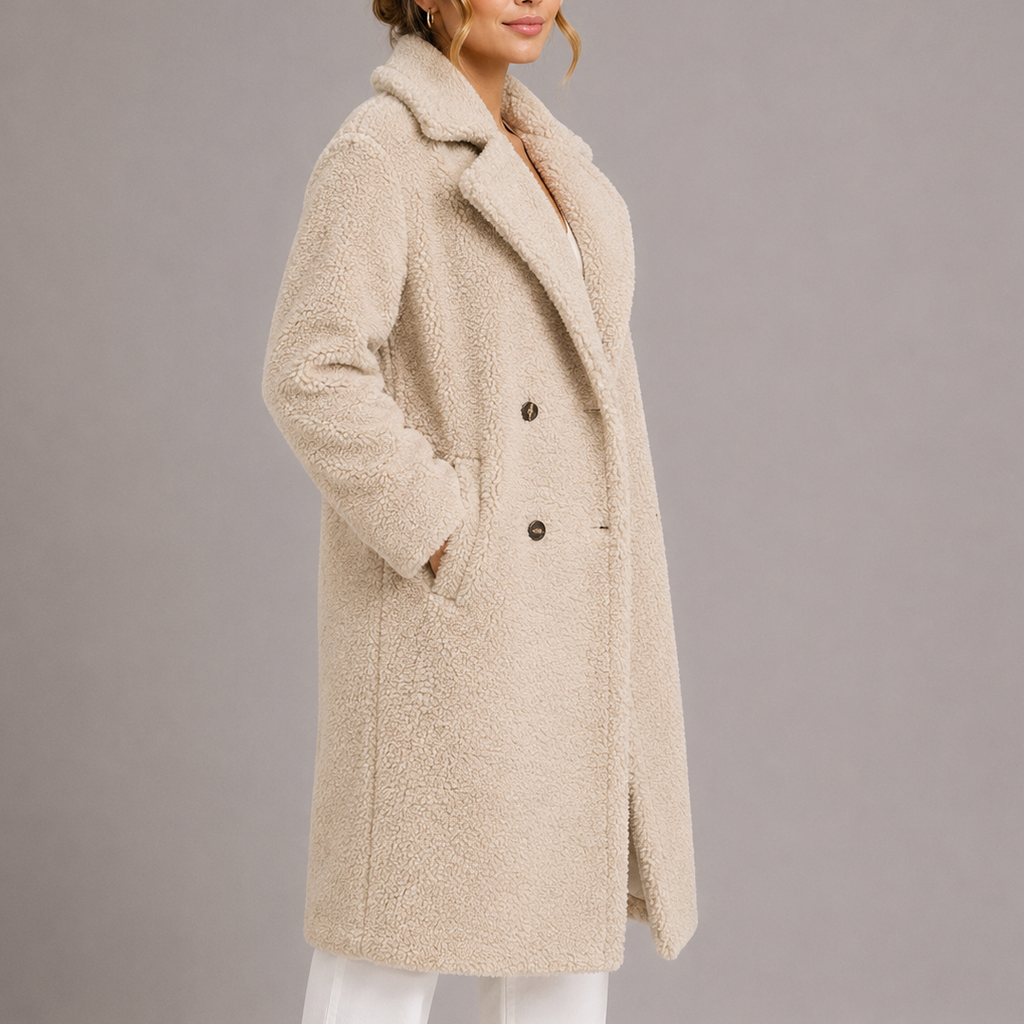 Beige long teddy coat with double-breasted front, notched collar, and side seam pockets