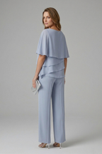 Women’s blue layered top and straight-leg trousers set, side view with layered top