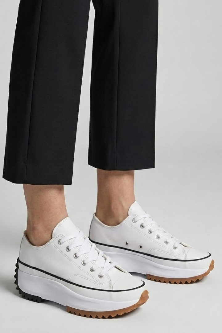 Women’s white trainers with leather platform sole and dark rubber tread