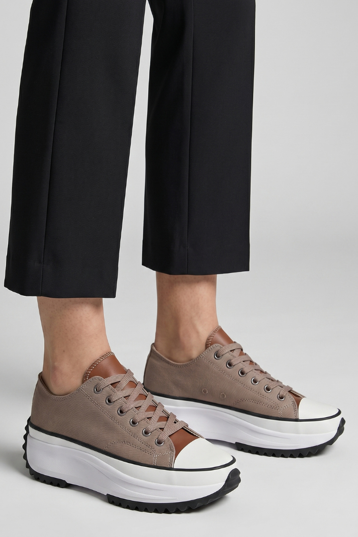 Women’s tan trainers with leather platform sole and dark rubber tread