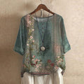 Women’s green floral print blouse, short sleeves, round neck, relaxed fit