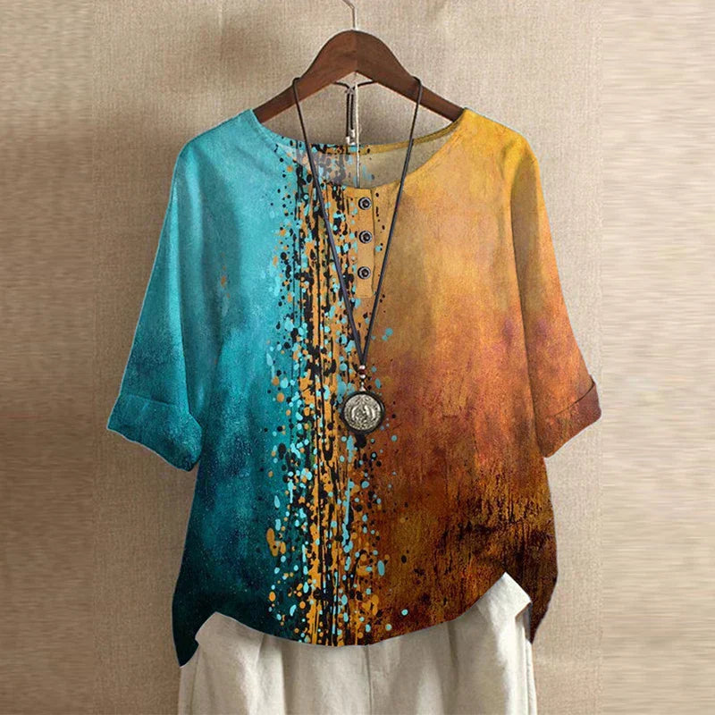 Women’s teal-to-orange abstract print blouse, short sleeves, round neck