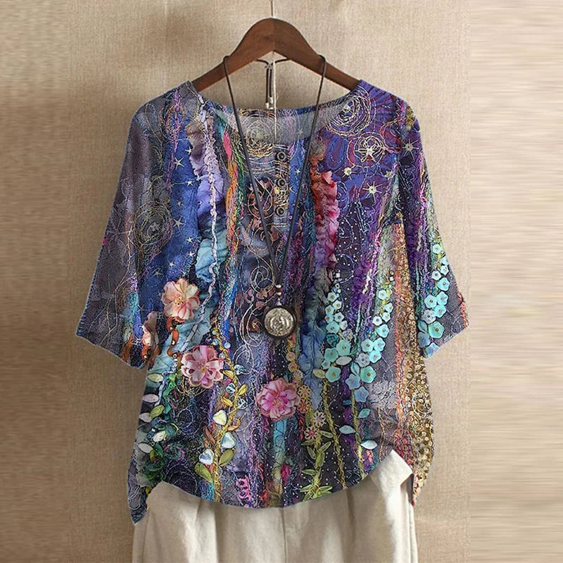 Women’s blue and purple floral print blouse, short sleeves, round neck