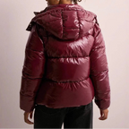 Women’s hooded quilted puffer coat, maroon, back view with hood and ribbed quilting
