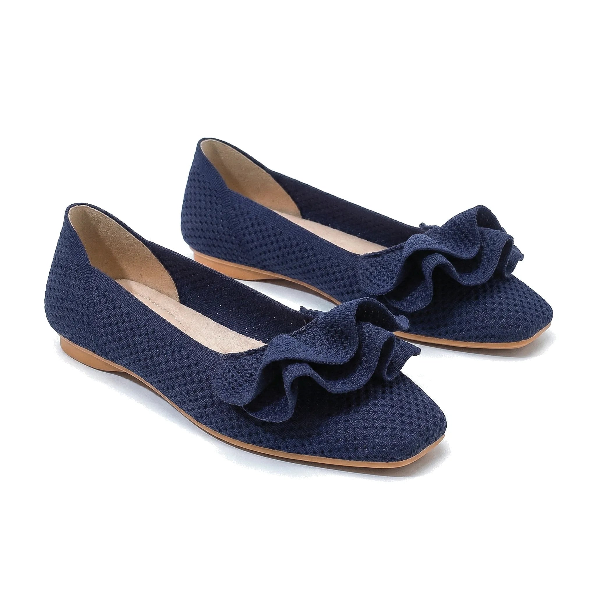 Navy wide-fit slip-on knit shoes with arch support, ruffled bow and tan outsole