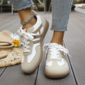 Women’s khaki and white lace-up sneakers with contrast trim and white laces