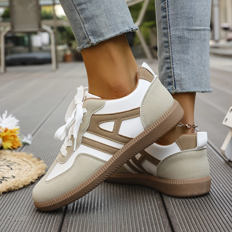 Women’s khaki and white lace-up sneakers, side view with lace-up front