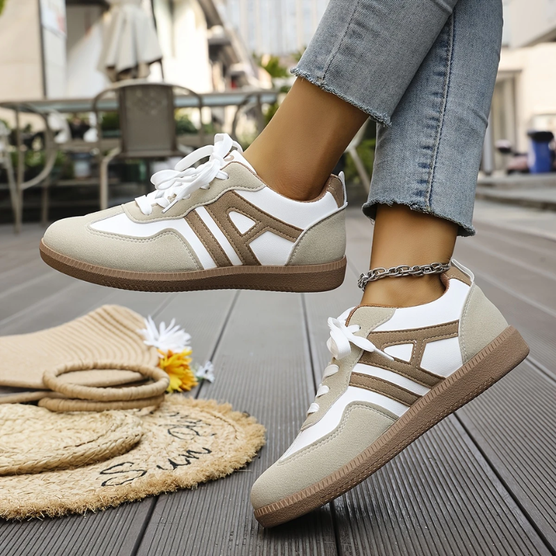 Women’s khaki and white lace-up sneakers with low-profile rubber sole