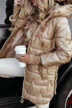 Beige hooded puffer jacket with front zipper and quilted panels, gold trim