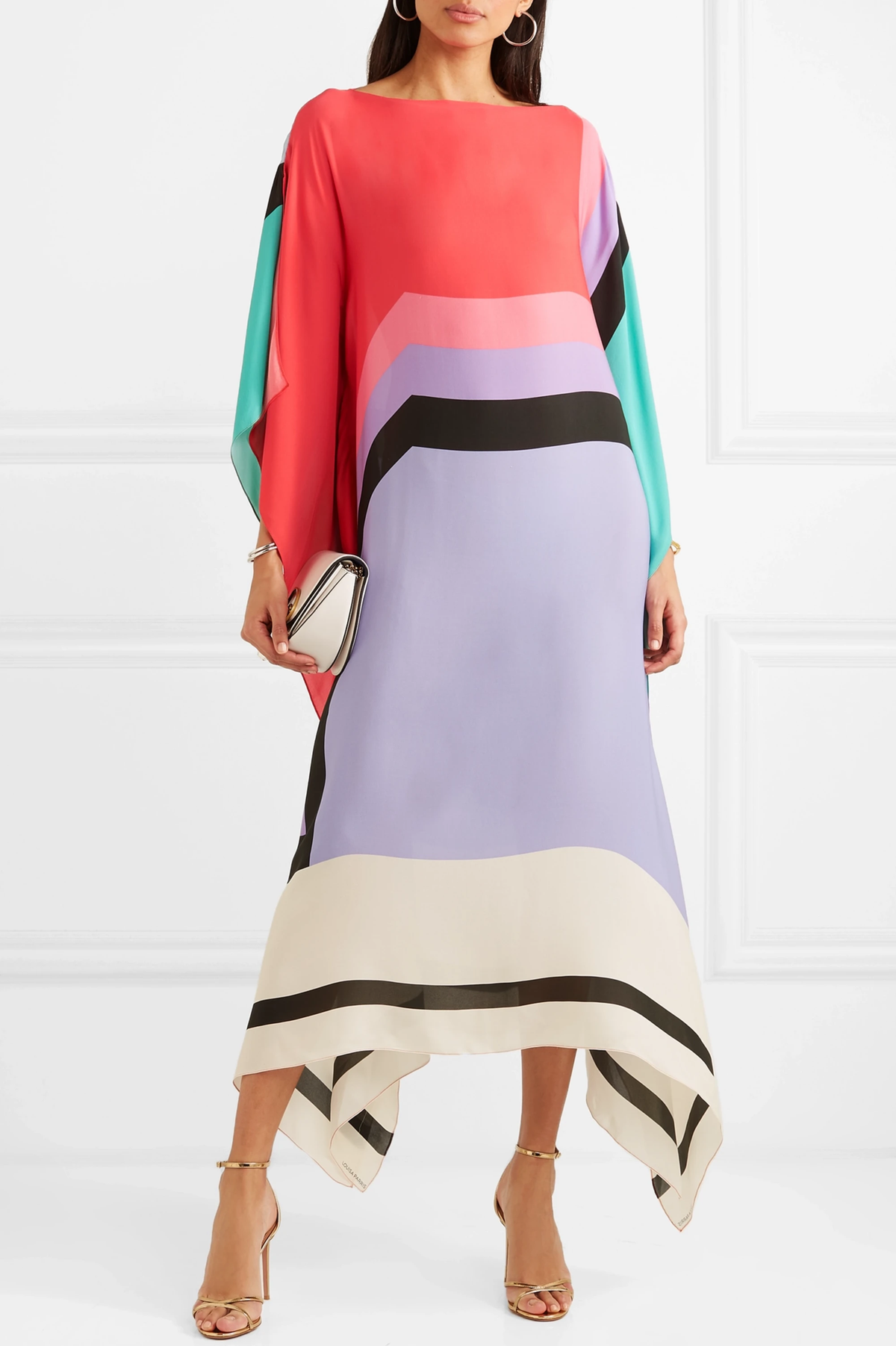 Statement caftan dress in red with abstract block panels, black stripes, and draped hem