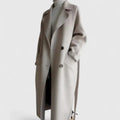 Beige long double-breasted coat with notched lapels and dark buttons