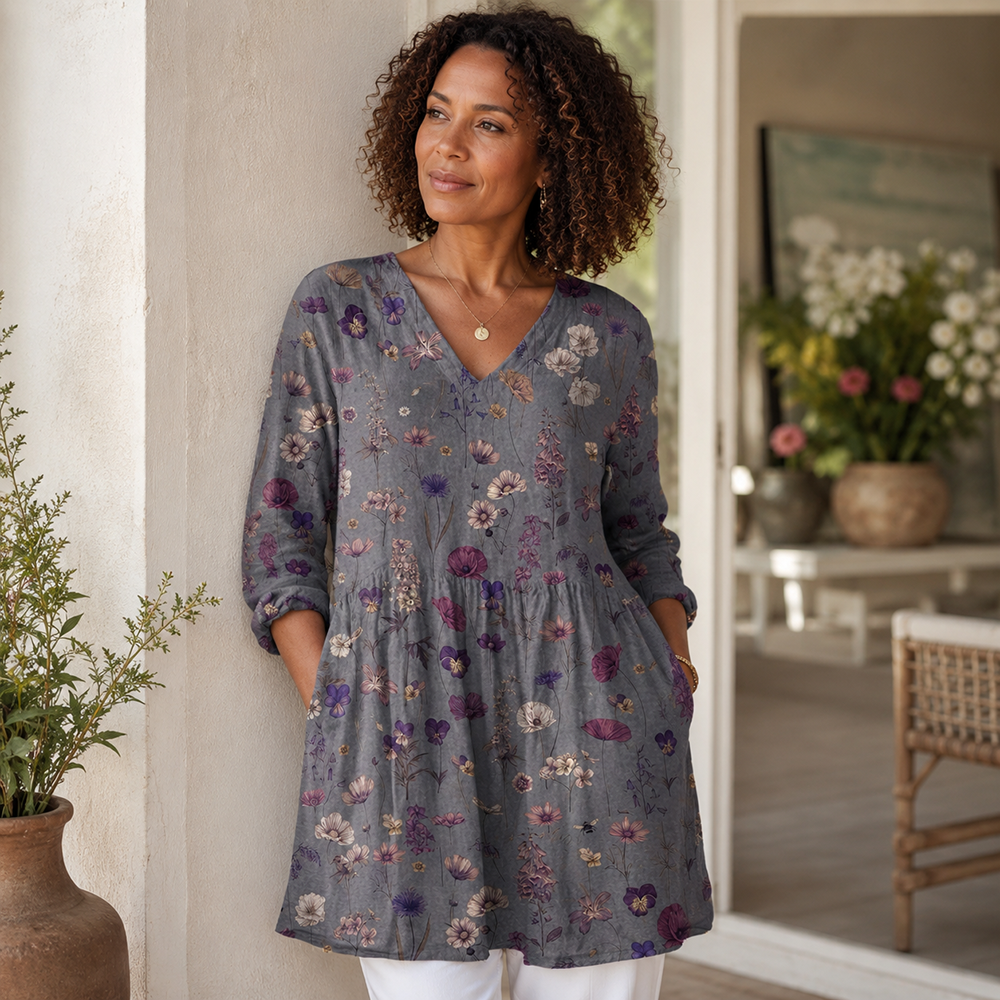 Grey floral V-neck long-sleeve blouse with gathered waist and relaxed drape
